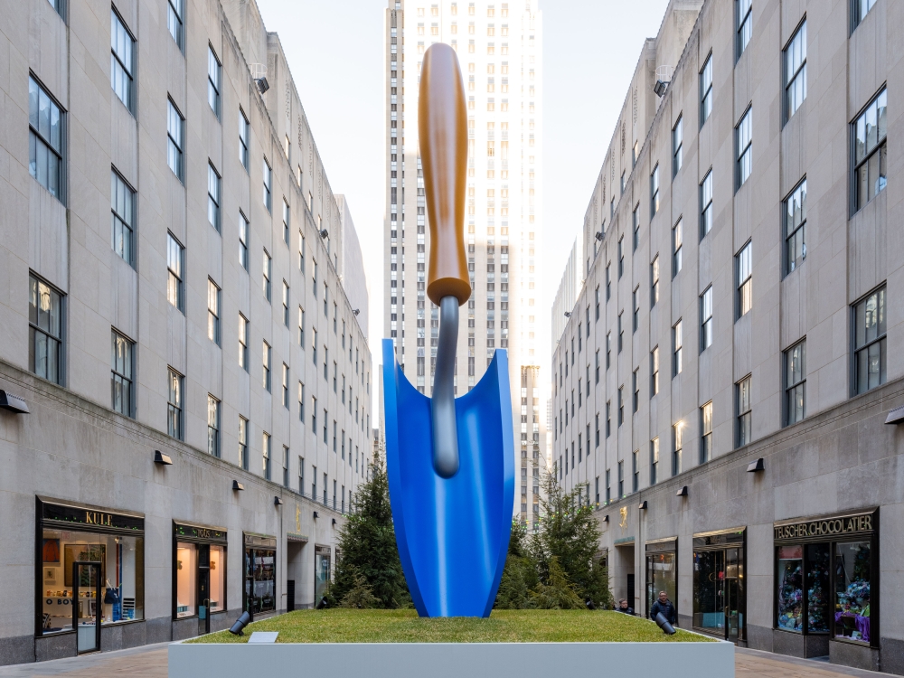 Shaye Weaver: "A massive blue gardening tool is digging into Rockefeller Center right now"